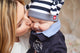 Happy mother and baby kissing