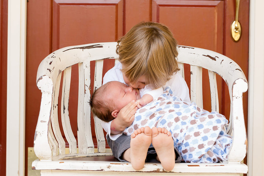 Funny baby kissing